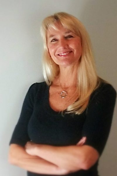 Upper body shot of CEO Teri Franics