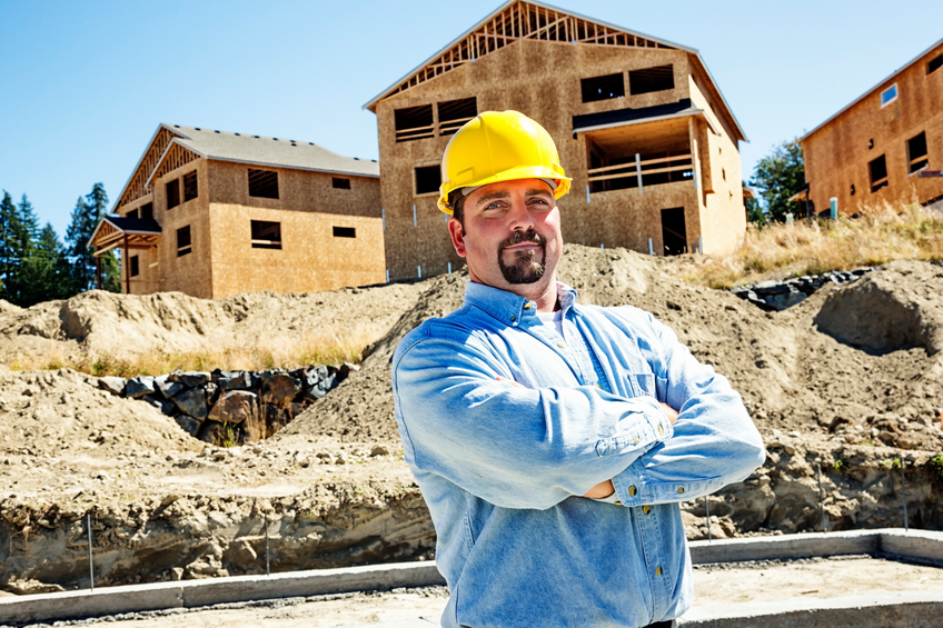 Construction Worker on Site with hard hat
